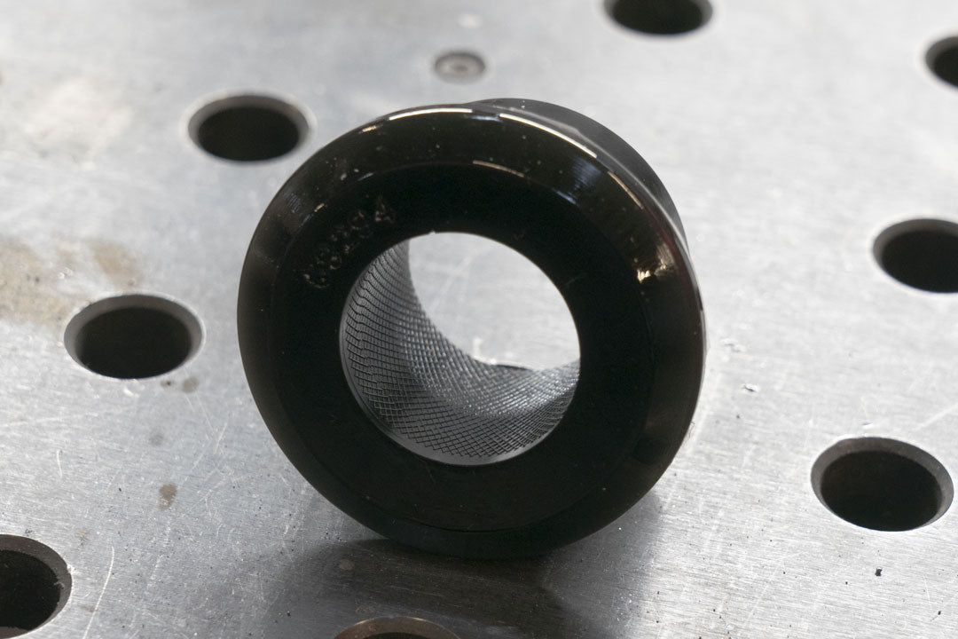 Polyurethane bushing for Transit AWD and RWD (2020-present), featuring high misalignment capability and durable material properties.