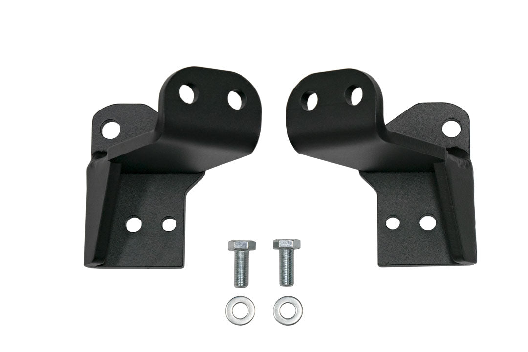 FRONT JOUNCE REINFORCEMENT BRACKET - SPRINTER 4X4 (2015-2022): Black metal brackets with screws and bolts for enhancing front suspension durability in rough terrains.
