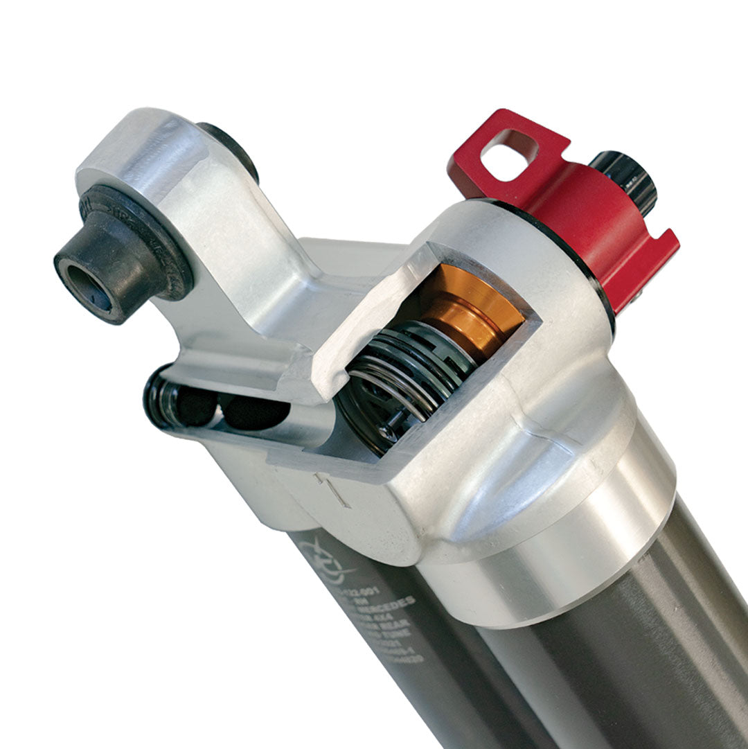 Close-up of the Stage 5 System, 2 Lift - Sprinter 2WD (2019+ 2500 Only) by Van Compass, showcasing a mechanical cylinder component.