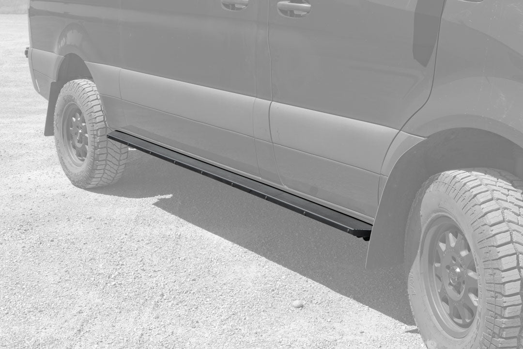 Side view of a Sprinter van fitted with Van Compass Rocker Guards, showcasing the robust 4 inch wide step for Sprinter AWD 144 wheelbase.