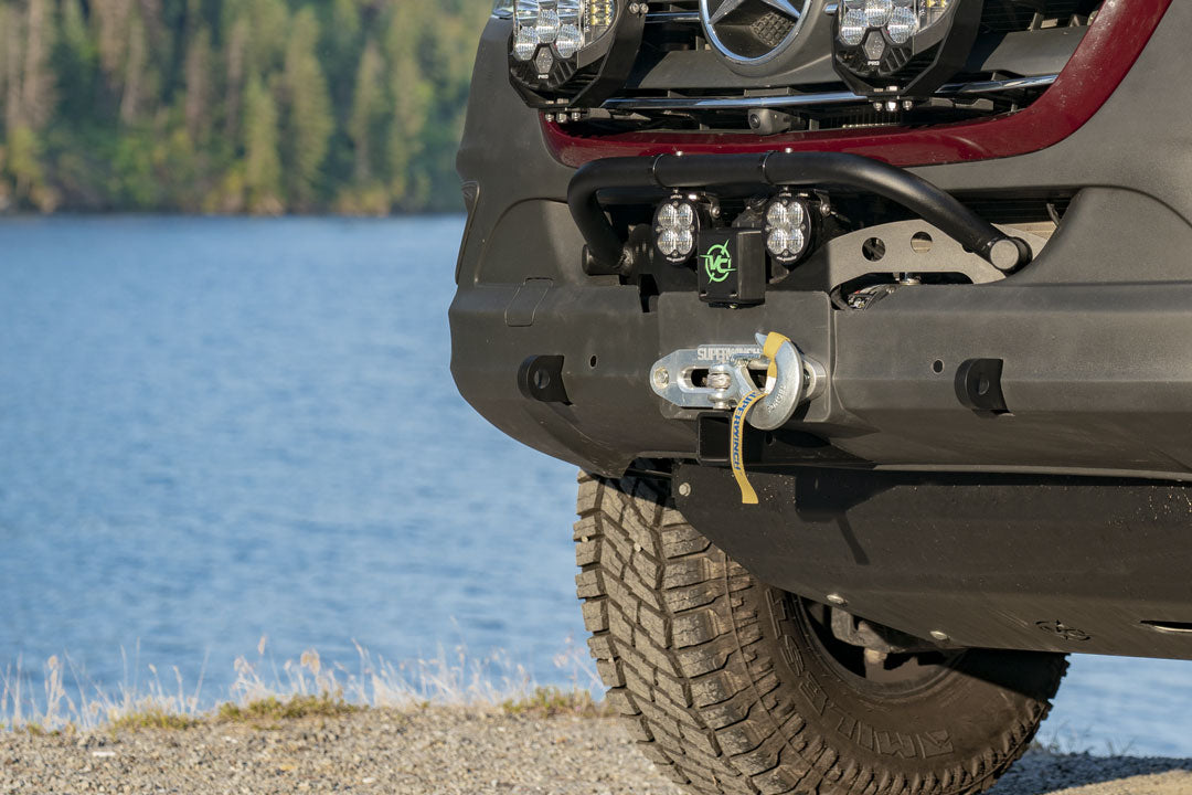Close-up of the VAN COMPASS FRONT WINCH MOUNT WITH BULL BAR for Sprinter (2019+), showing the robust bumper design with integrated winch and tow points.