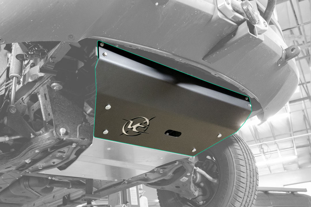Engine skid plate for 2023+ Sprinter AWD by Van Compass, shown installed on vehicle, highlighting robust design for drivetrain protection during off-road use.