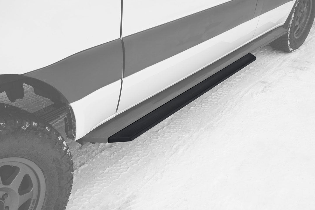 ROCKER GUARD SLIDER DOOR STEP EXTENSION - SPRINTER 4X4 (2015-2022 144 WHEELBASE ONLY) by VAN COMPASS, attached to a van's passenger side, enhancing step functionality.
