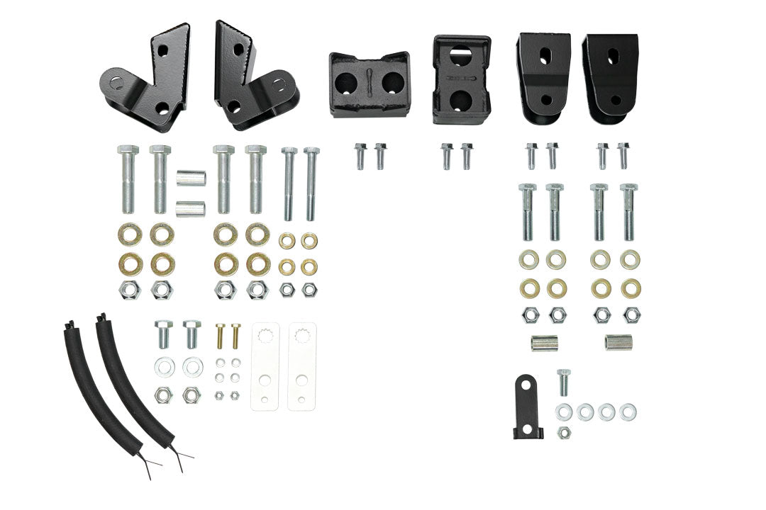 STAGE 6.3 DUALLY 2 LIFT SYSTEM - SPRINTER 4X4 (2015-18 3500) by VAN COMPASS, showing detailed black metal parts and brackets essential for enhanced suspension and handling.