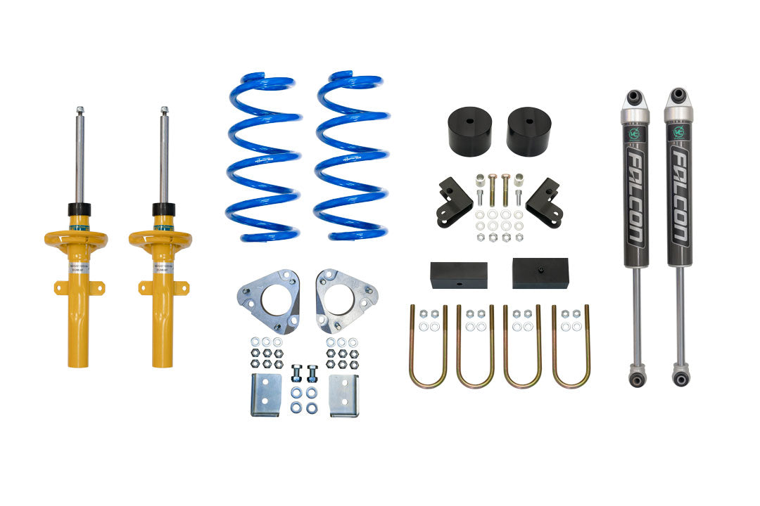 STAGE 1 TOPO 2.0 SYSTEM - TRANSIT RWD by VAN COMPASS: Includes yellow shock absorber, blue springs, and metal components for improved ride quality and handling.