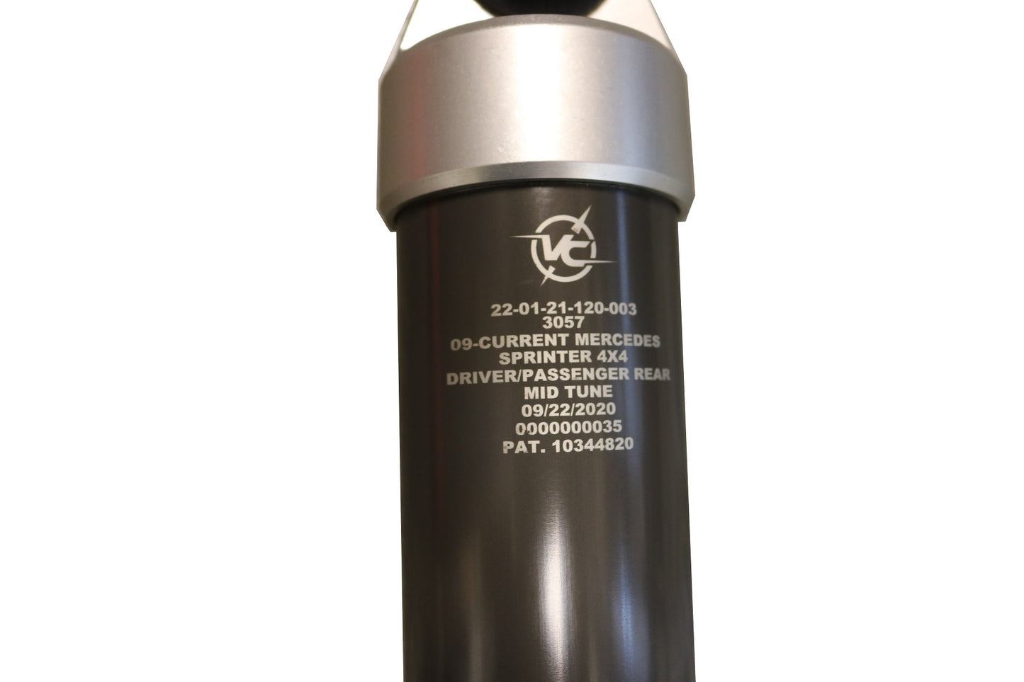 Falcon 2.1 Monotube Rear Shocks for Sprinter 4x4, black and silver cylinder with round top, enhances ride comfort and stability.