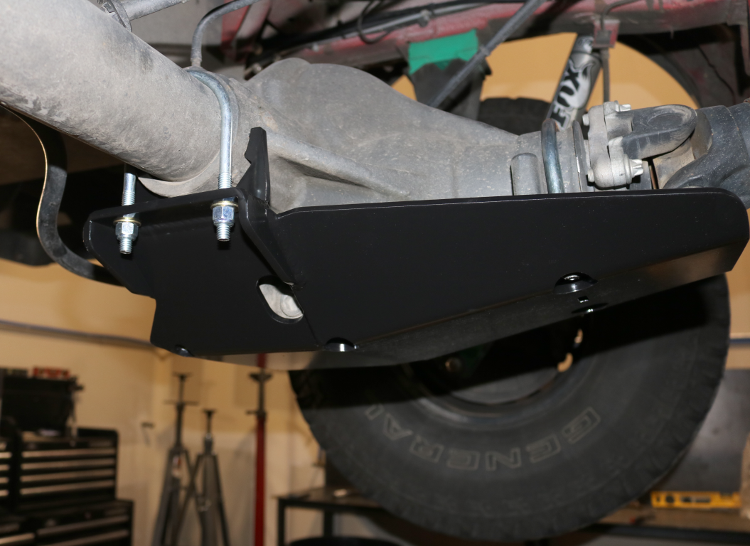 Differential skid plate for Sprinter (2015+ 2500) by Van Compass, showcasing a close-up of the metal plate designed to protect the rear differential.
