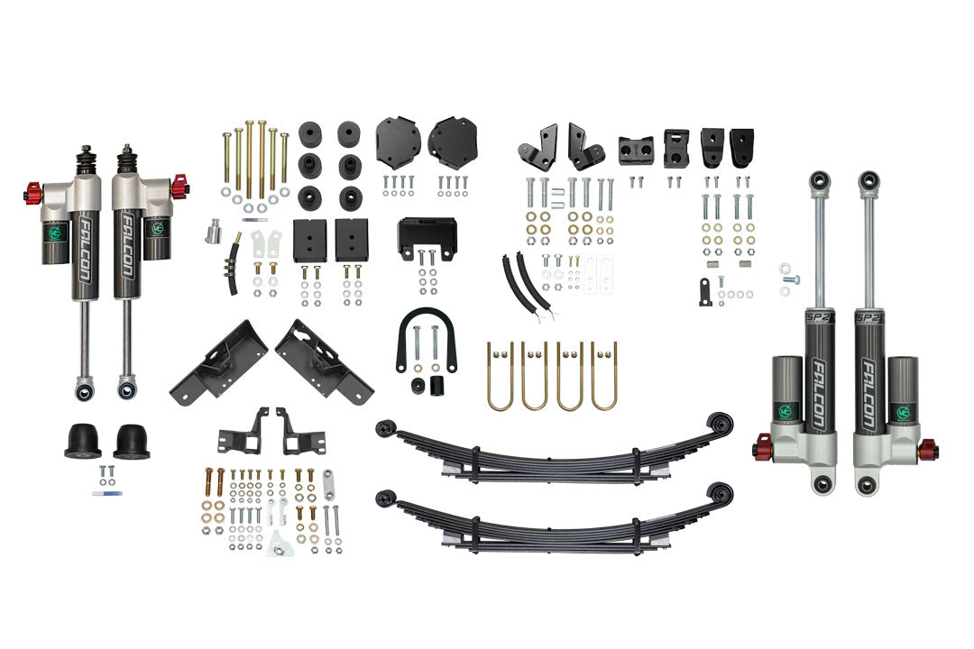 STAGE 6.3 DUALLY 2 LIFT SYSTEM - SPRINTER 4X4 (2019-2022 3500) by VAN COMPASS, featuring various vehicle parts, black pipes, and adjustable Falcon 3.3 shocks.