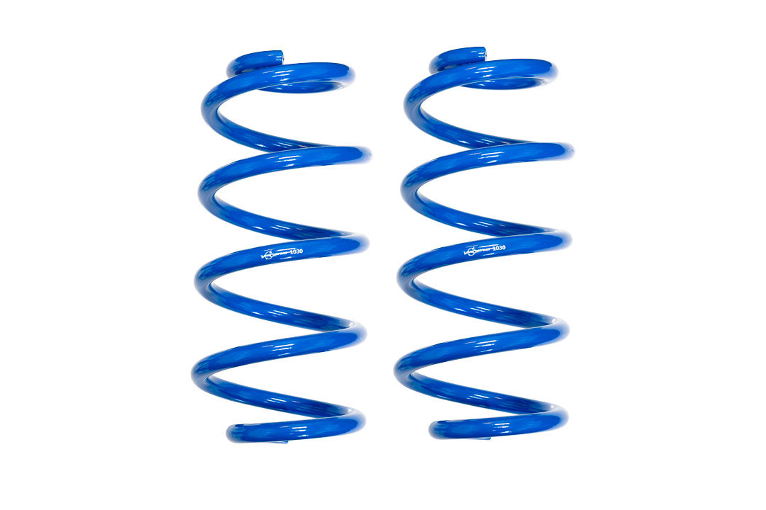 Front 1 Lift Coil Springs for 2013+ Ford Transit by Van Compass, showing several blue coil springs designed to improve ride quality and stance.