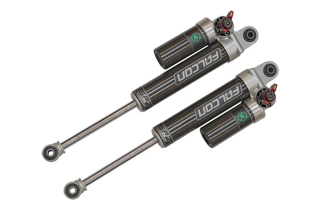 Pair of Falcon 3.3 SP2 Fast Adjust Rear Shocks for Sprinter 4x4, showcasing black and silver shock absorbers with an adjustable red knob for enhanced vehicle control.