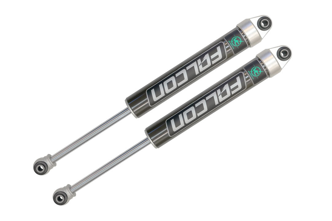 Pair of Falcon 2.1 Monotube Rear Shocks for Sprinter 4x4 (2015-2018 2500), showcasing black and silver design, enhancing vehicle control and comfort.