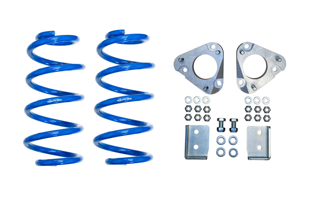 TOPO 2.0 Front Leveling Kit for 2013-Present Ford Transit by Van Compass, showing blue springs, screws, and metal components for suspension lift and alignment.