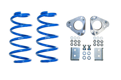 TOPO 2.0 Front Leveling Kit for 2013-Present Ford Transit by Van Compass, showing blue springs, screws, and metal components for suspension lift and alignment.