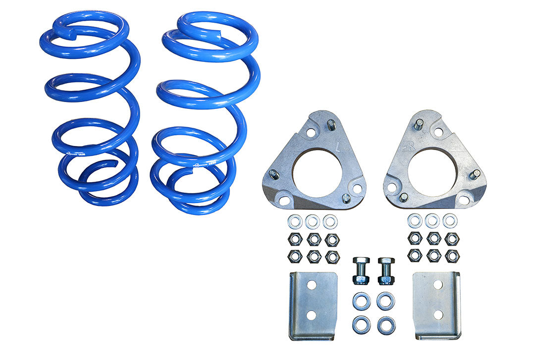 Blue coil spring and metal parts from the STAGE 3 TOPO 2.0 SYSTEM - TRANSIT RWD by VAN COMPASS for enhanced handling and stability.