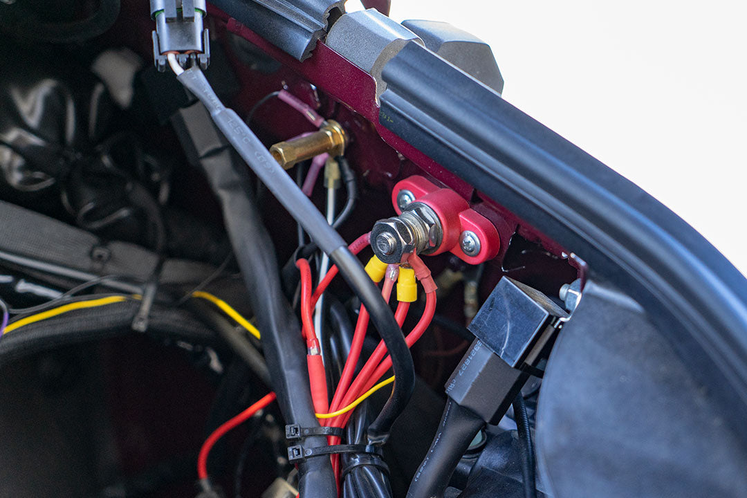 Close-up of the BIG POWER DISTRIBUTION KIT - SPRINTER (2019+) by VAN COMPASS, showing detailed wiring and a post terminal for winch power supply.